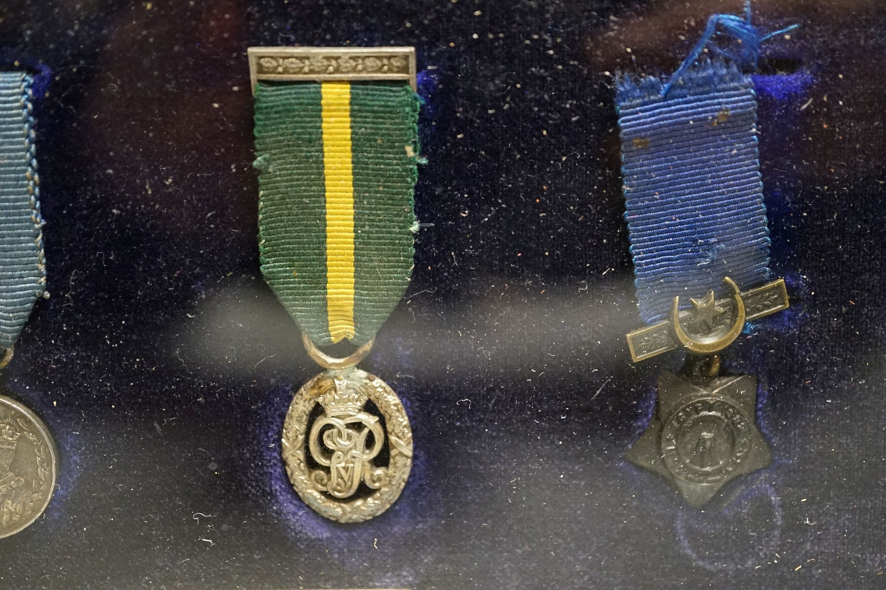 A group of Victoria to George V miniature medals to Major J N Townsend, DSO, TD, cased